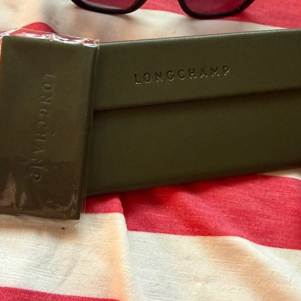 Longchamp 715S Women’s Black Cat-Eye Sunglasses with Purple Gradient Lenses NIC